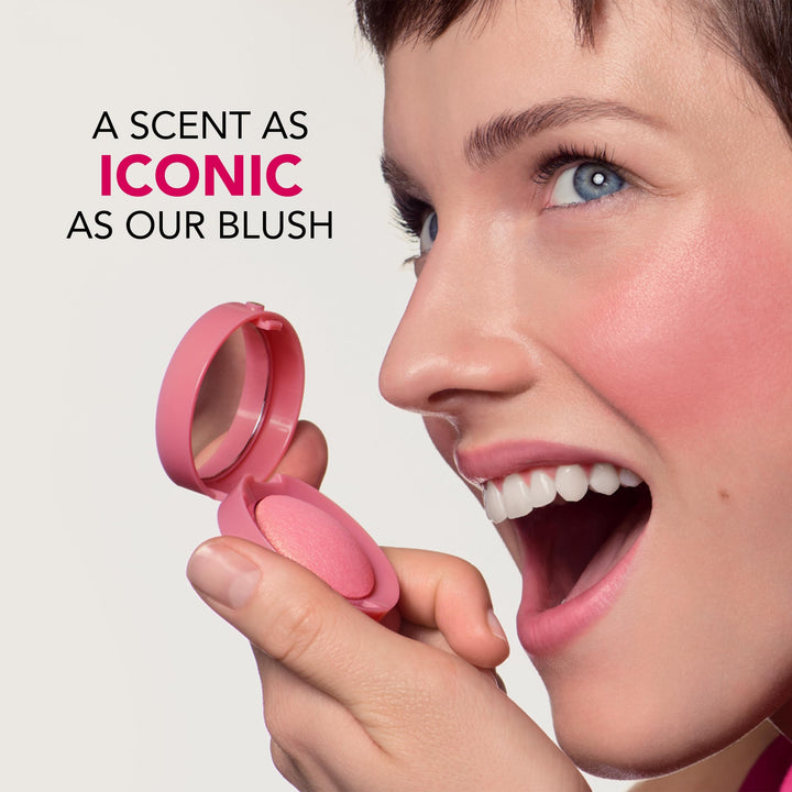 Small baked cheek compact with mirror, brush and warm rose powder shade