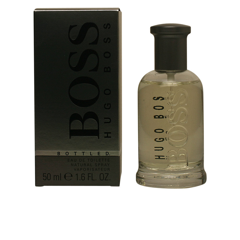 50 ml clear bottle of woody-fruity Eau de Toilette for Man, spray cap