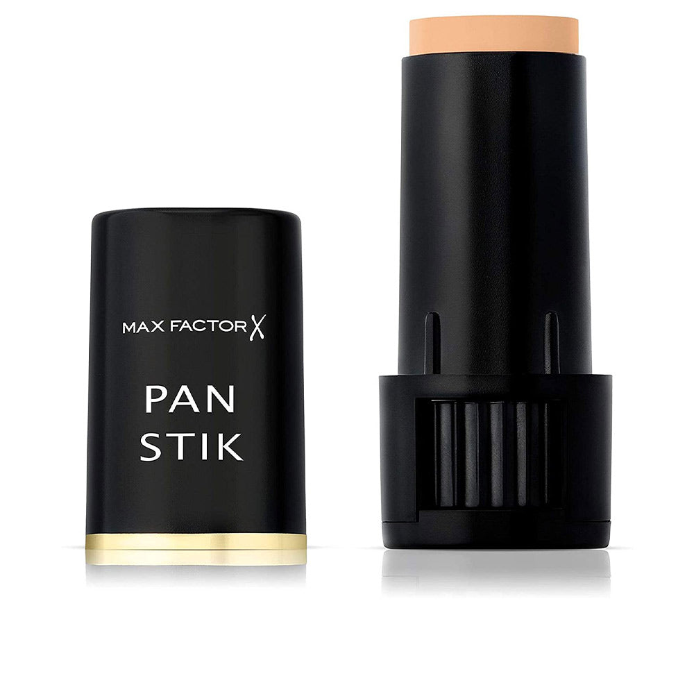 Creamy beige corrector stick in twist-up tube, shade cool copper