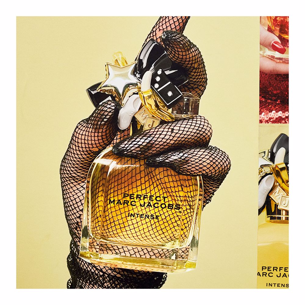 100 ml amber-hued eau de parfum bottle; warm floral woody fragrance
