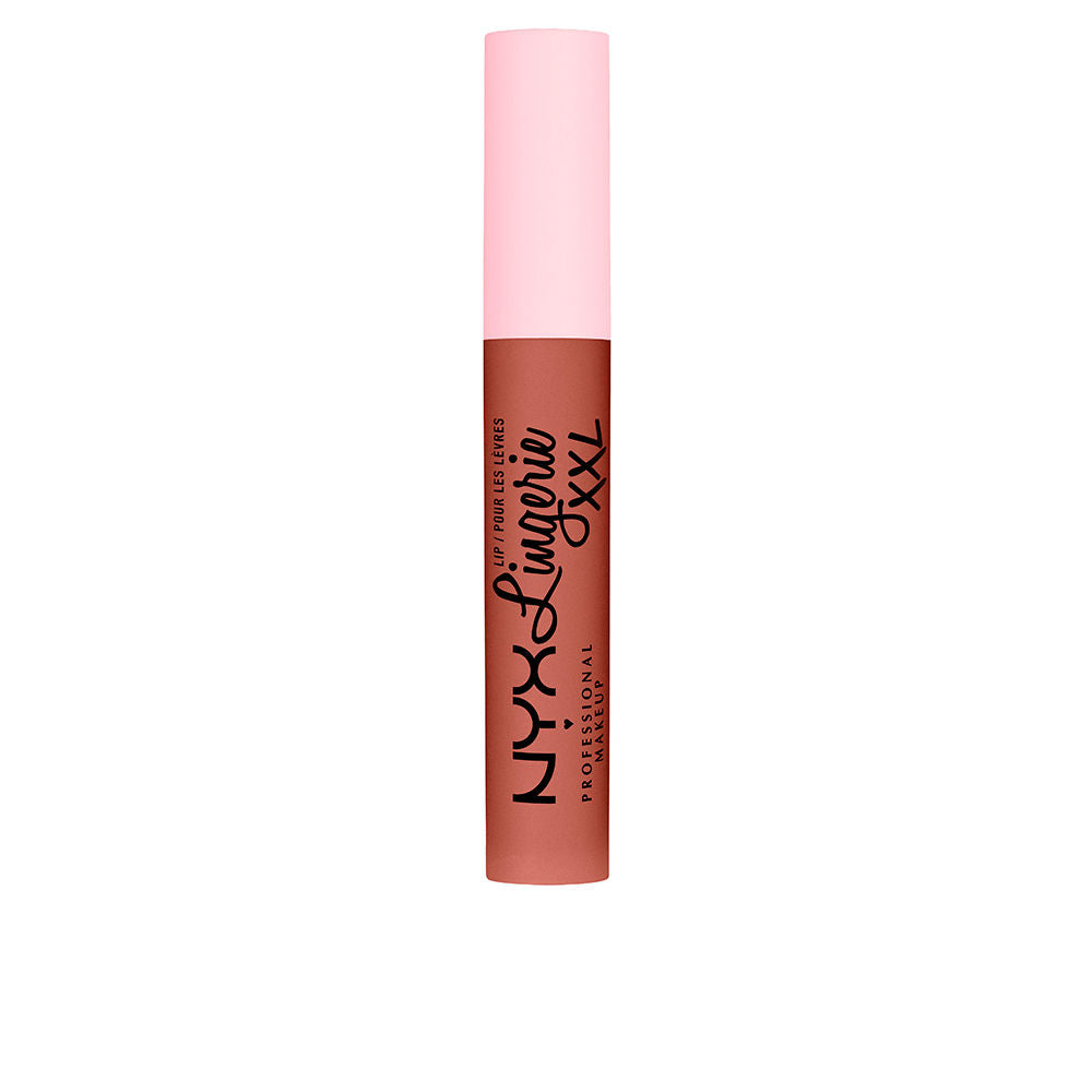 Unisex model wearing matte brown liquid lipstick, doe-foot applicator visible