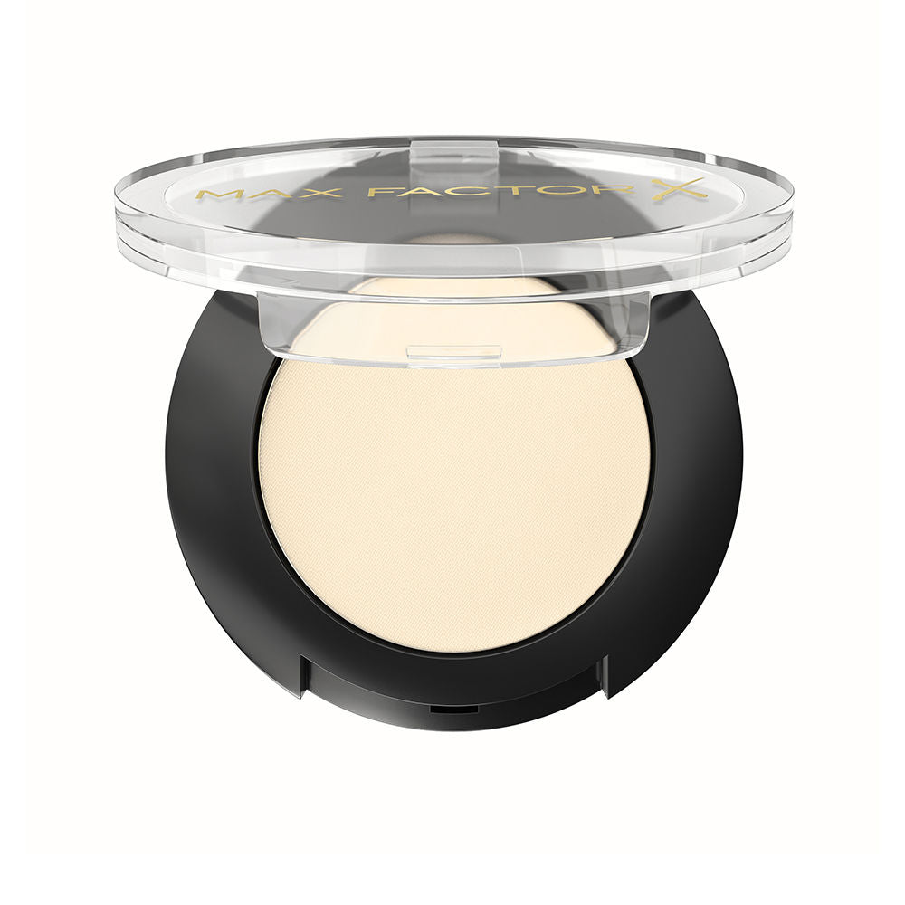 Single 2 g pressed eye shadow pan in warm honey nude, velvety finish
