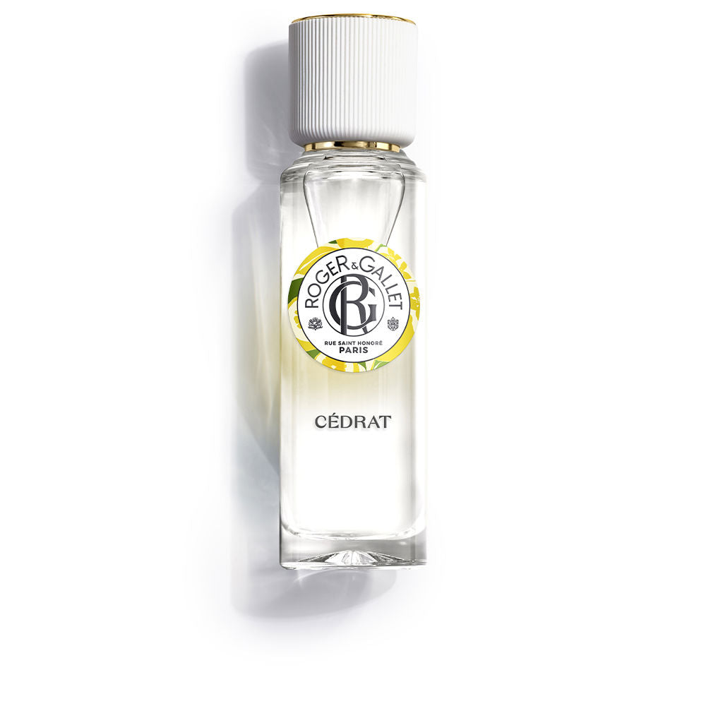 Glass perfume bottle, 30 ml, clear with pale yellow liquid, citrus and cedar notes
