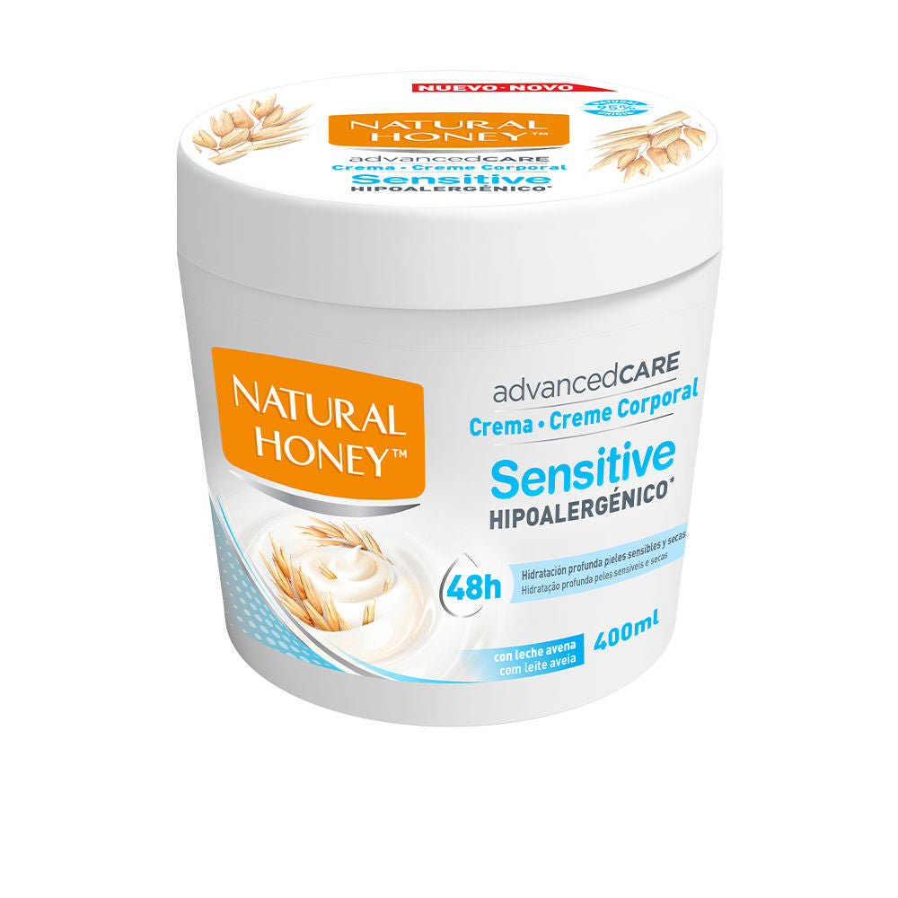 Bottle of Natural Honey Advancedcare rapid-absorb body cream with dispenser