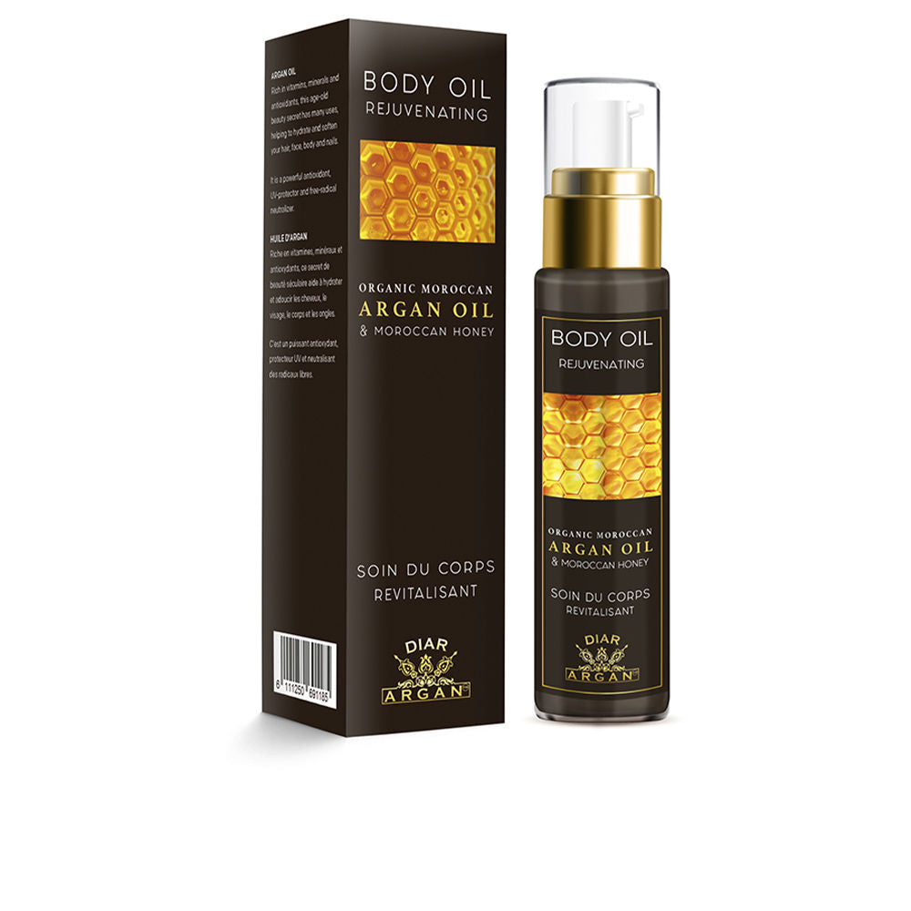 50 ml glass bottle of argan and honey dry body oil with golden hue