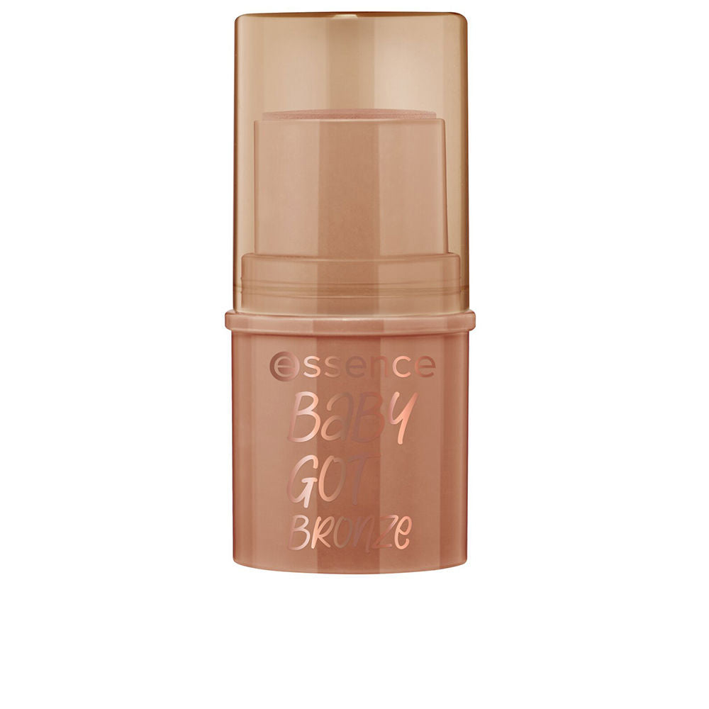 Cream bronzer stick in compact tube, warm tan shade, 5.5 g