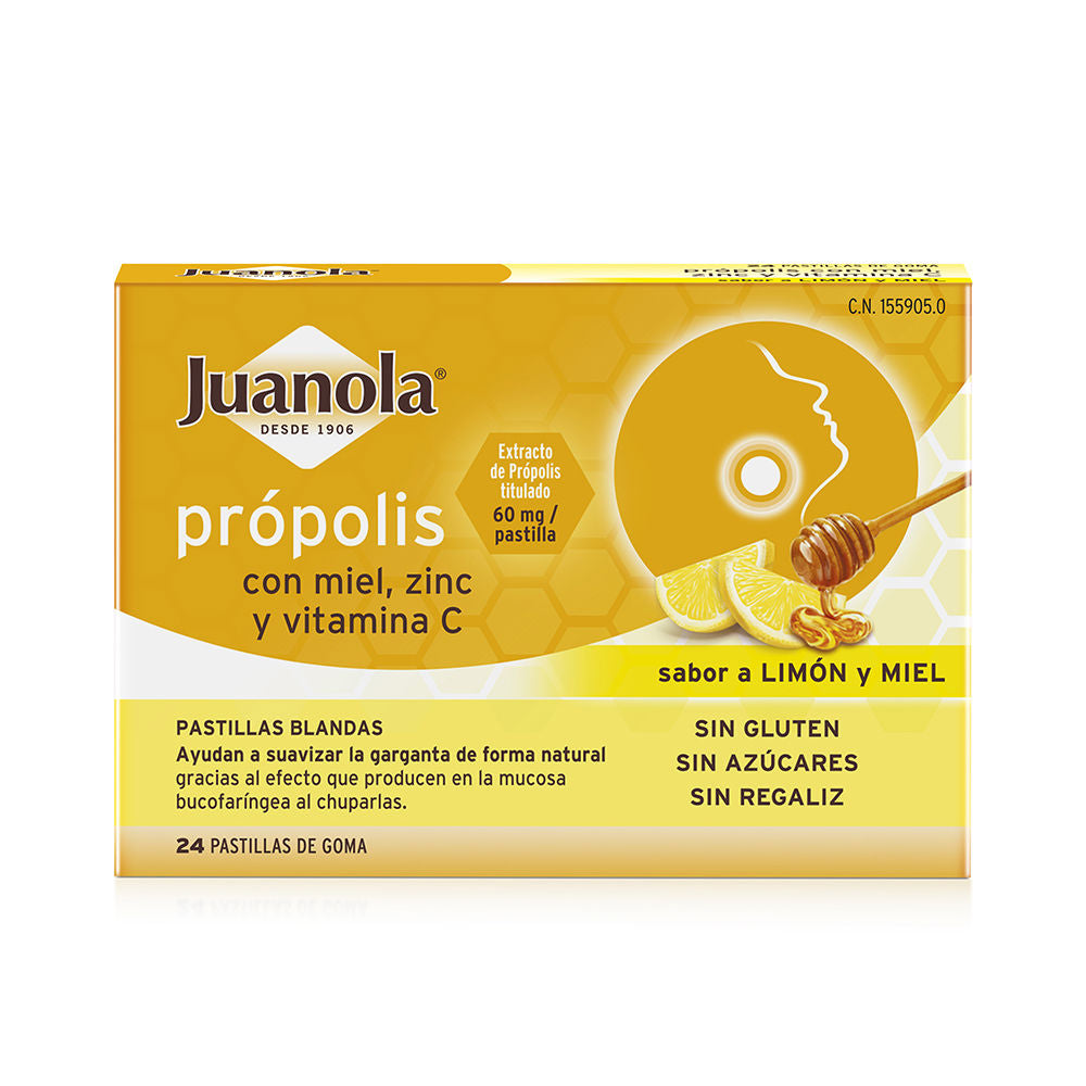 Juanola Yellow soft lozenges in jar beside honey dipper and lemon slices, hexagonal-pattern backdrop