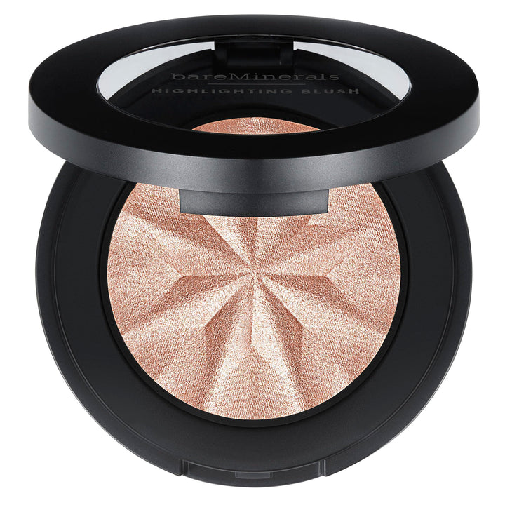 Compact cream blush in soft opal pink with subtle pearl sheen, 3.8 g