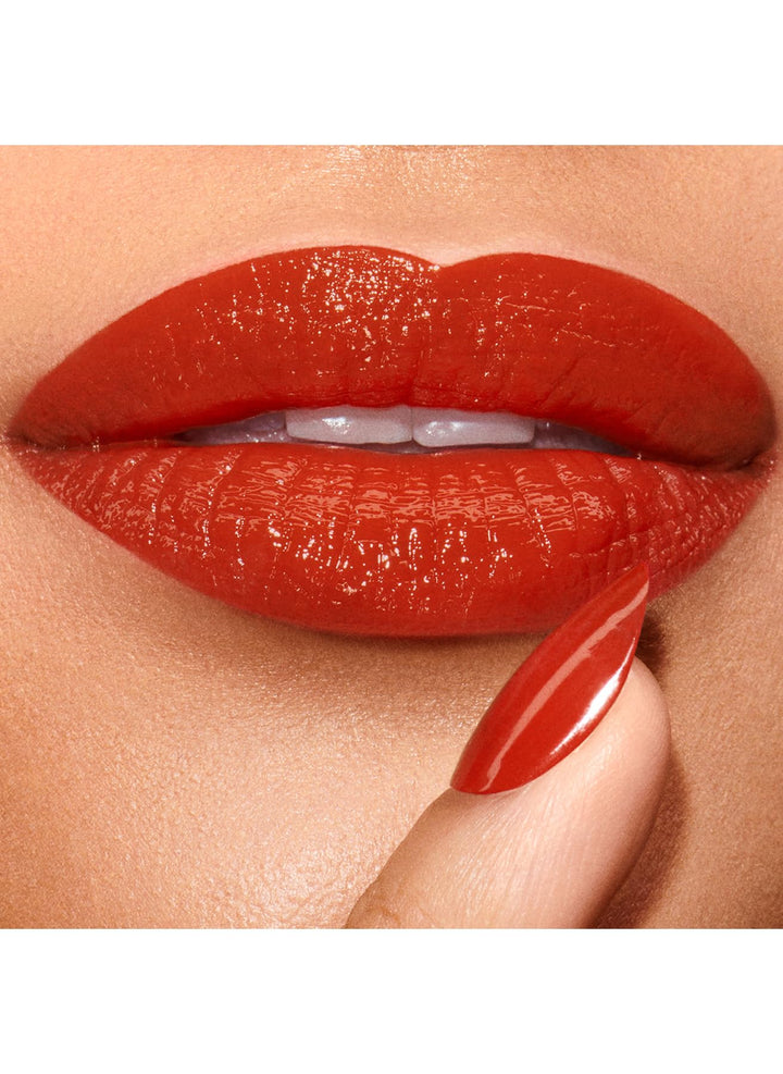 Glossy red lipstick in fluted rose‑gold case, shade 333 Sabotage