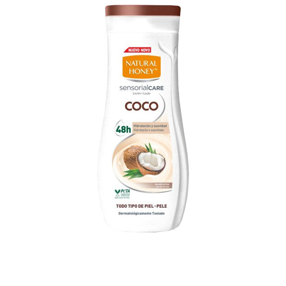 Natural Honey White plastic curved body lotion bottle with brown flip-top cap and coconut image on label