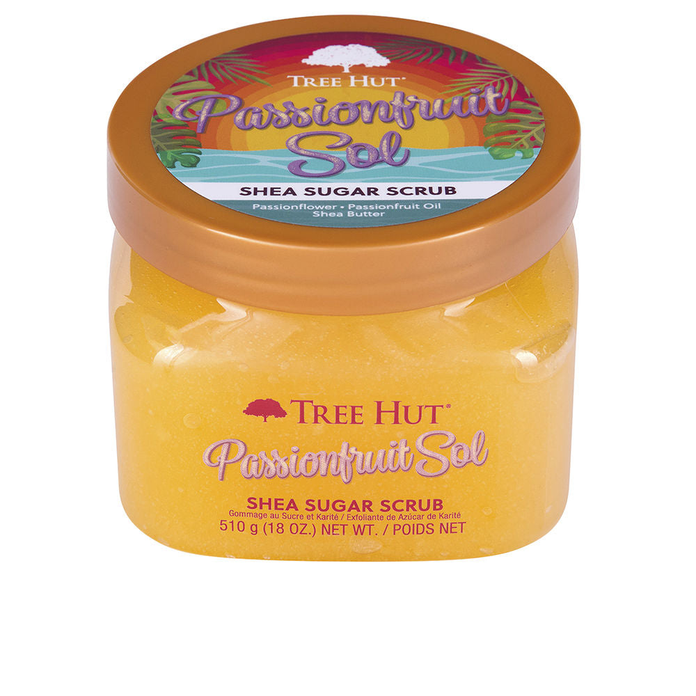 Tree Hut Transparent plastic jar of yellow-orange passion fruit body scrub with round lid and colorful tropical label