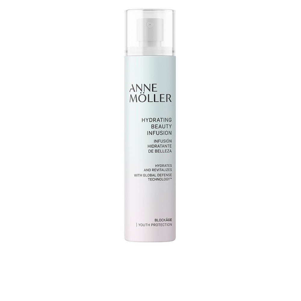 Anne Möller hydration spray bottle with matte finish, fine mist visible, clean cylindrical silhouette