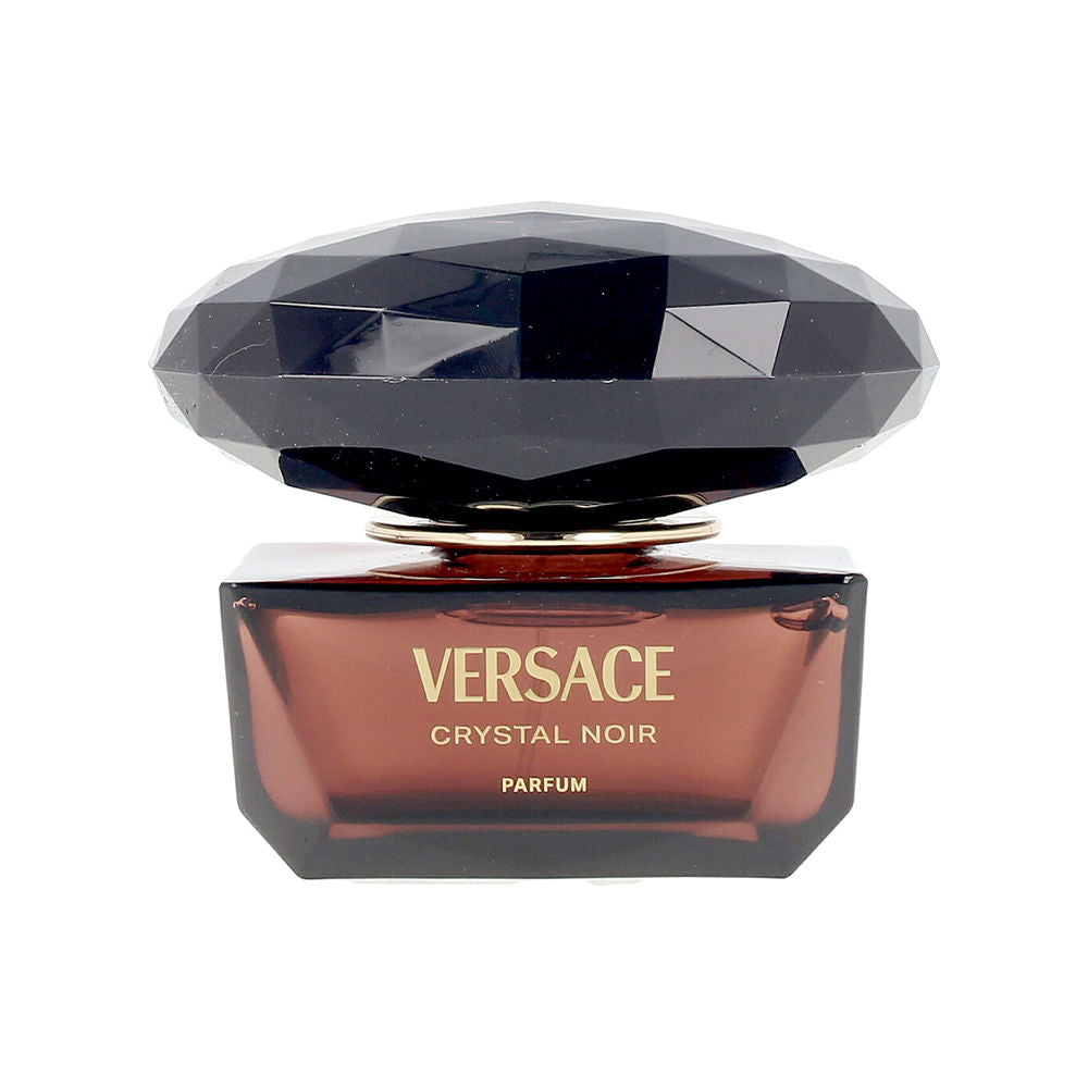 50 ml clear glass perfume bottle with amber-hued liquid, elegant stopper