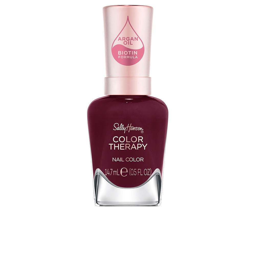 Bottle of deep garnet nail polish, 14.7 ml, cream finish
