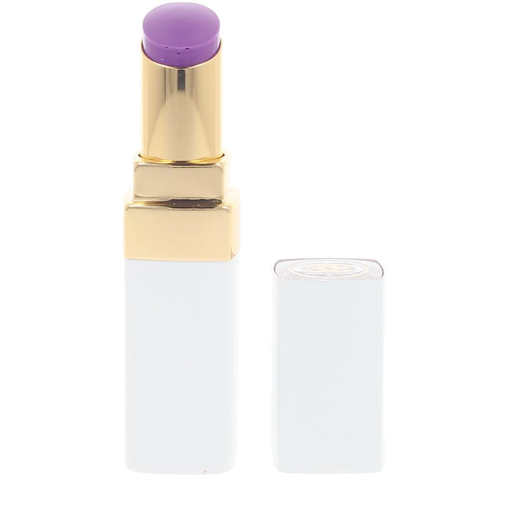 Small 3 g lilac-tinted glossy treatment lip balm in clear-top case