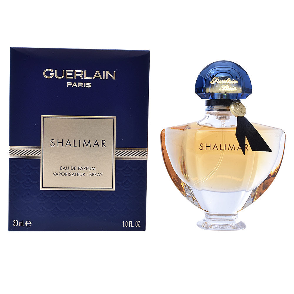 30 ml fluted glass perfume bottle with fan-shaped cap, amber liquid