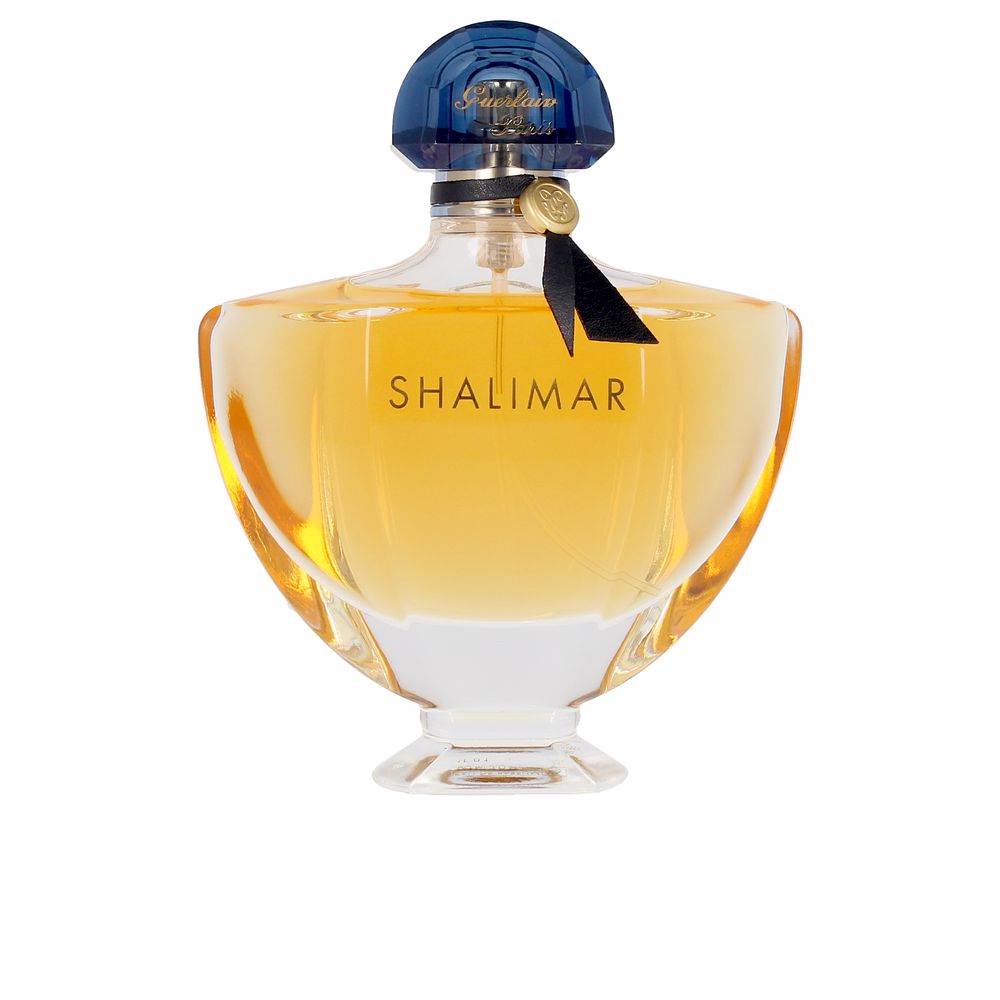 30 ml fluted glass perfume bottle with fan-shaped cap, amber liquid