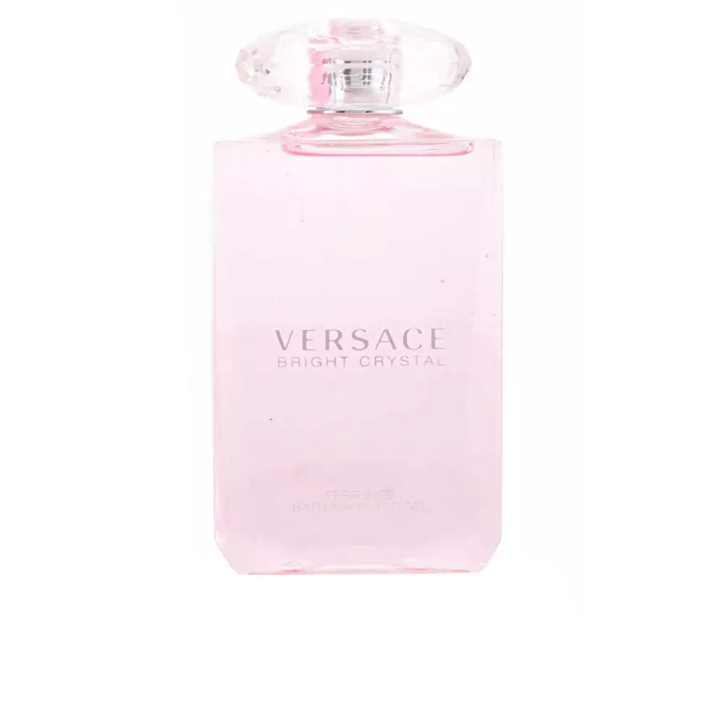 Versace Light pink glass rectangular bottle with faceted oval cap and printed front text, expert-crafted feel