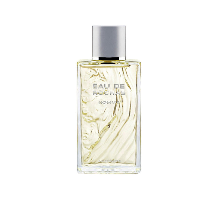 Sculptural clear bottle of Eau de Rochas Homme with fresh citrus-aromatic fragrance