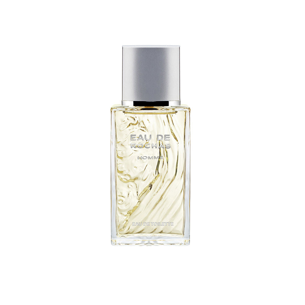 Sculptural clear bottle of Eau de Rochas Homme with fresh citrus-aromatic fragrance