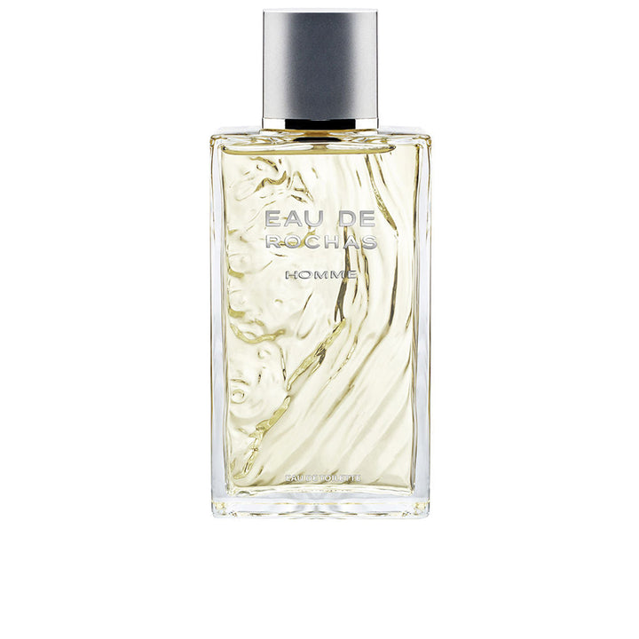 Sculptural clear bottle of Eau de Rochas Homme with fresh citrus-aromatic fragrance