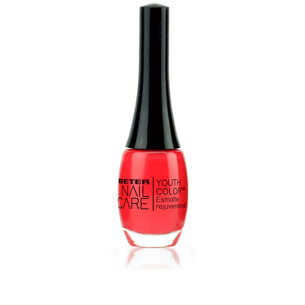 11 ml bottle of almost-red nail polish with glossy finish, treatment formula