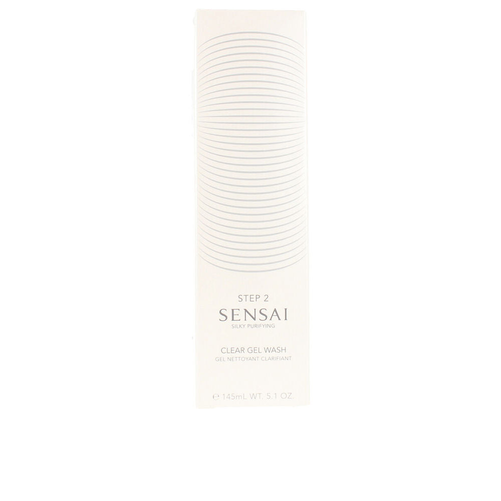 White rectangular paper box with horizontal curved lines and printed text, minimalist facial cleanser packaging by Sensai.