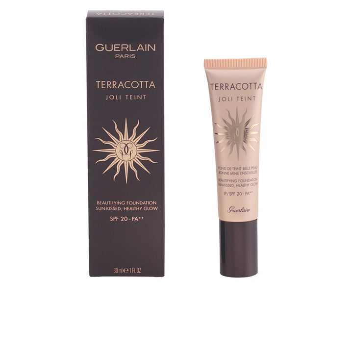 Glass bottle of terracotta fluid foundation, warm dark shade, 30 ml