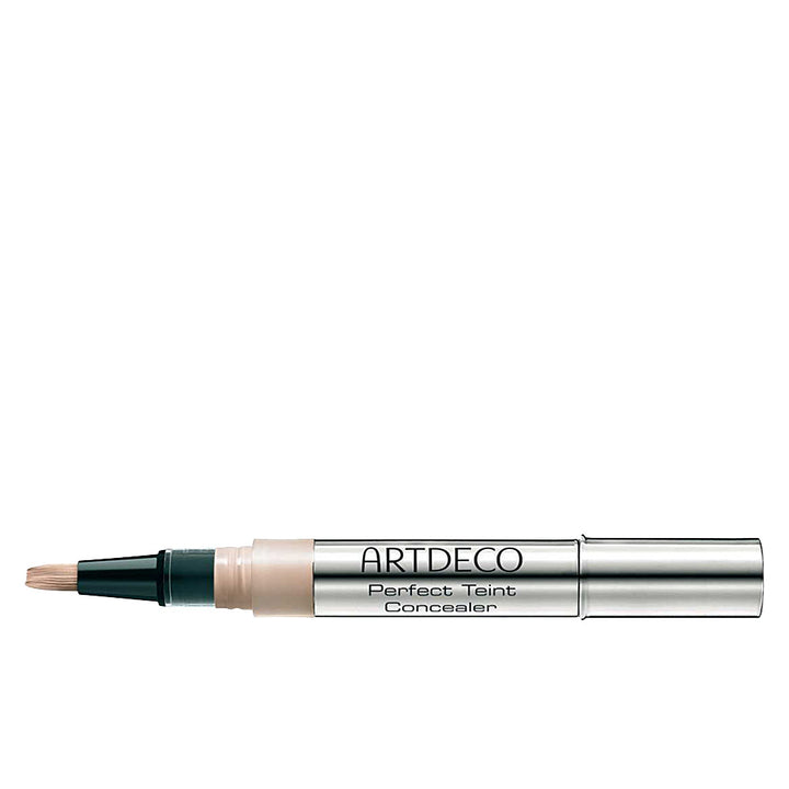 Small 2 ml fluid concealer in shade 03-peach with integrated brush applicator