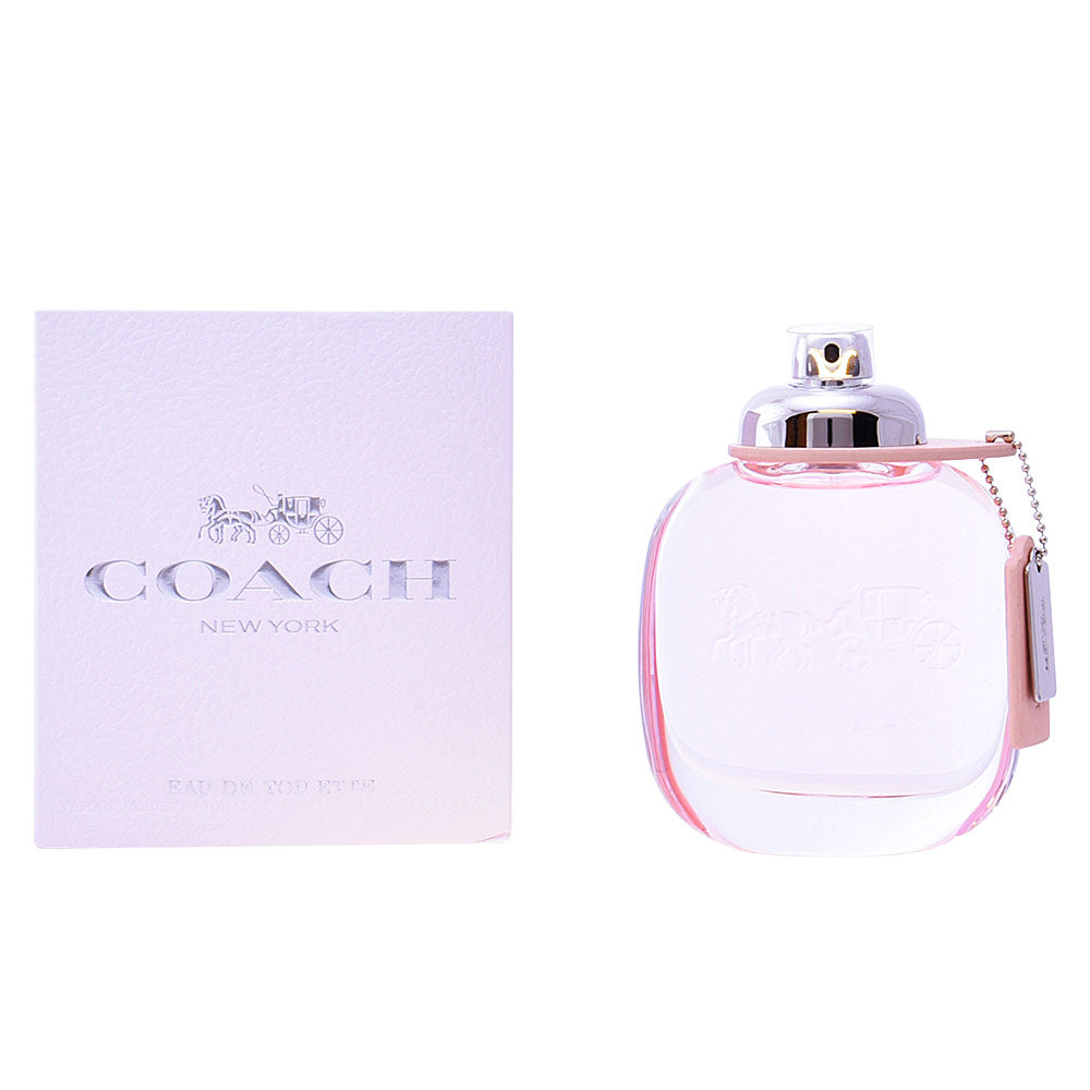 Oval Coach perfume bottle in white, soft pink and silver with feminine design details