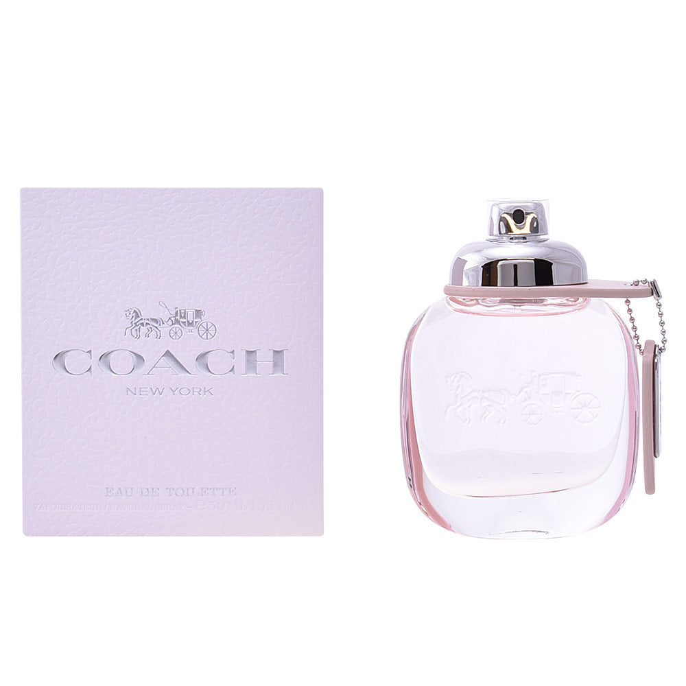 Oval Coach perfume bottle in white, soft pink and silver with feminine design details