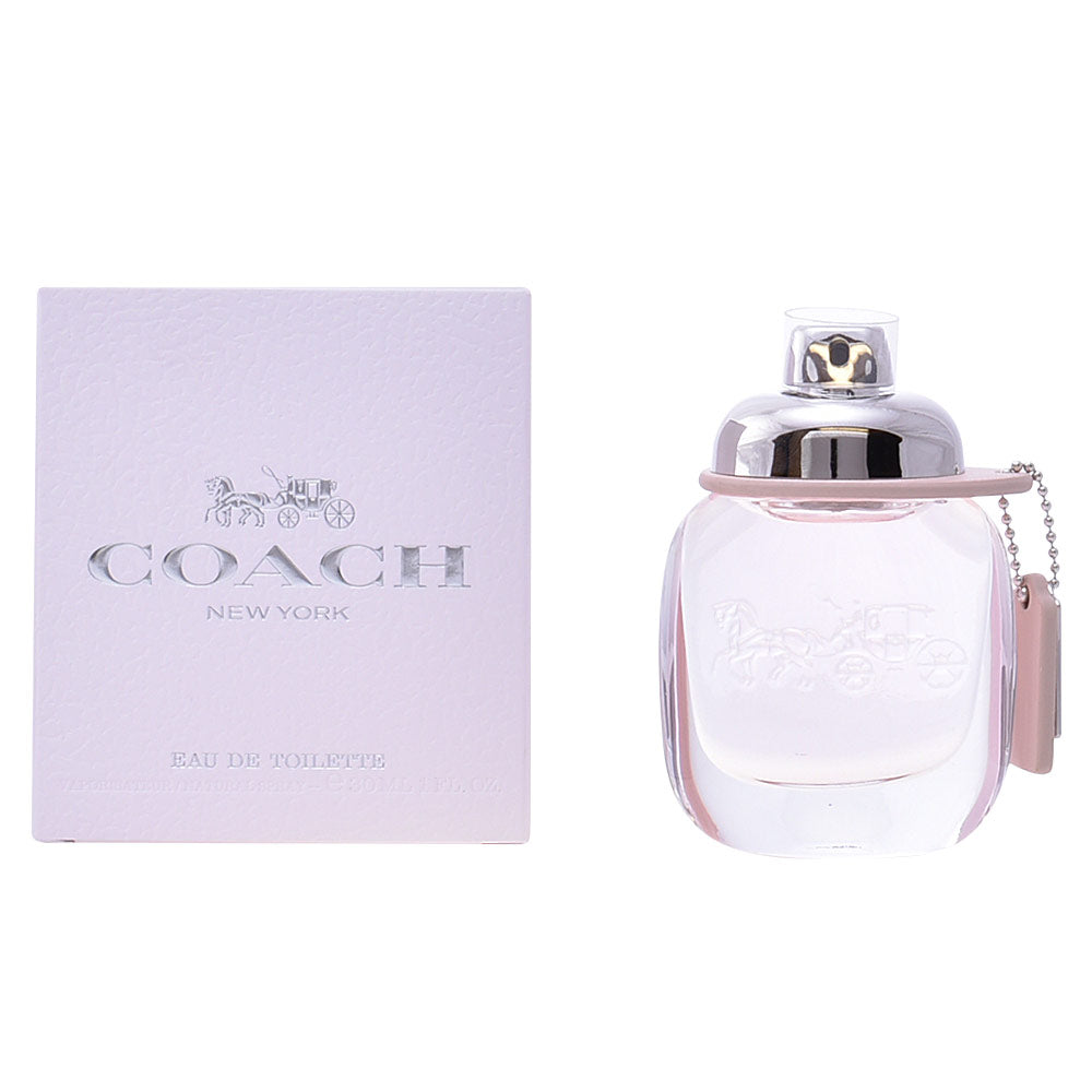 Oval Coach perfume bottle in white, soft pink and silver with feminine design details