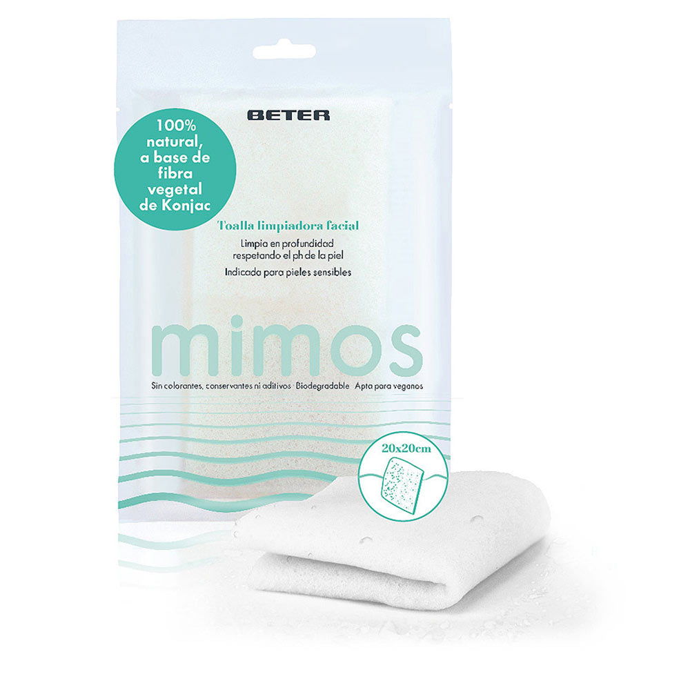 White konjac facial cleansing towel with textured fiber surface, folded with droplets and printed packaging — Beter