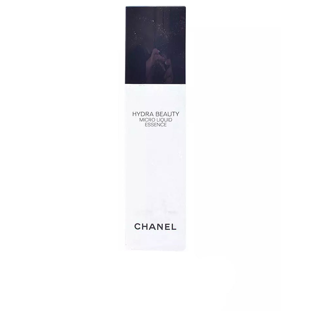 Chanel-branded minimalist black-and-white rectangular paper box with printed text, clean edges visible