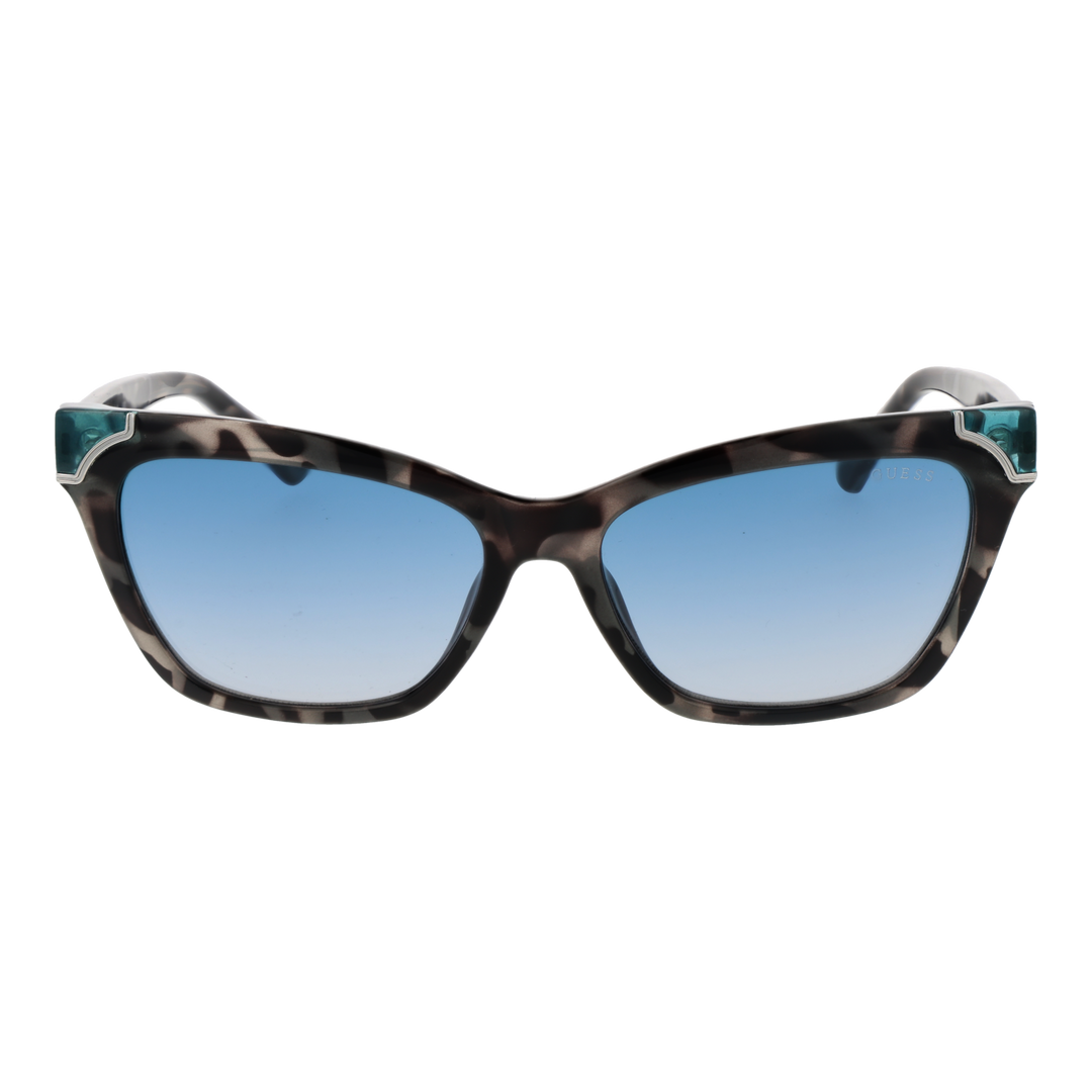 Guess tortoise cat-eye sunglasses with blue gradient lenses and teal corner accents on a neutral background