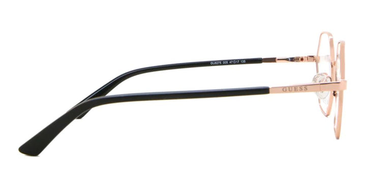 Rose gold hexagonal full-rim eyeglasses in stainless steel with black temple tips on neutral background