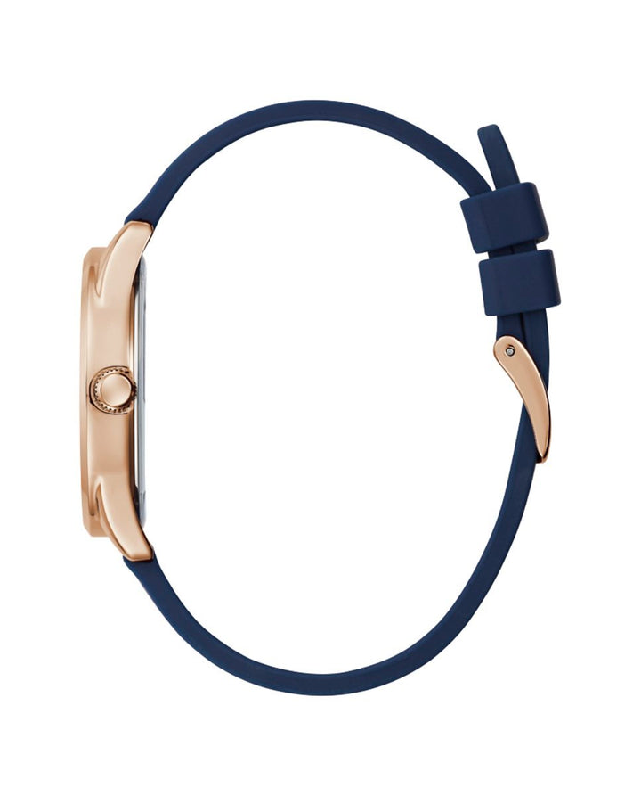 Guess rose gold wristwatch with navy silicone strap and rose gold mineral dial, front-facing on white background