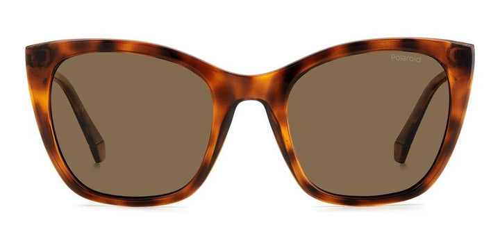 Tortoiseshell cat-eye sunglasses with gold metal temples and polarized brown lenses on white background