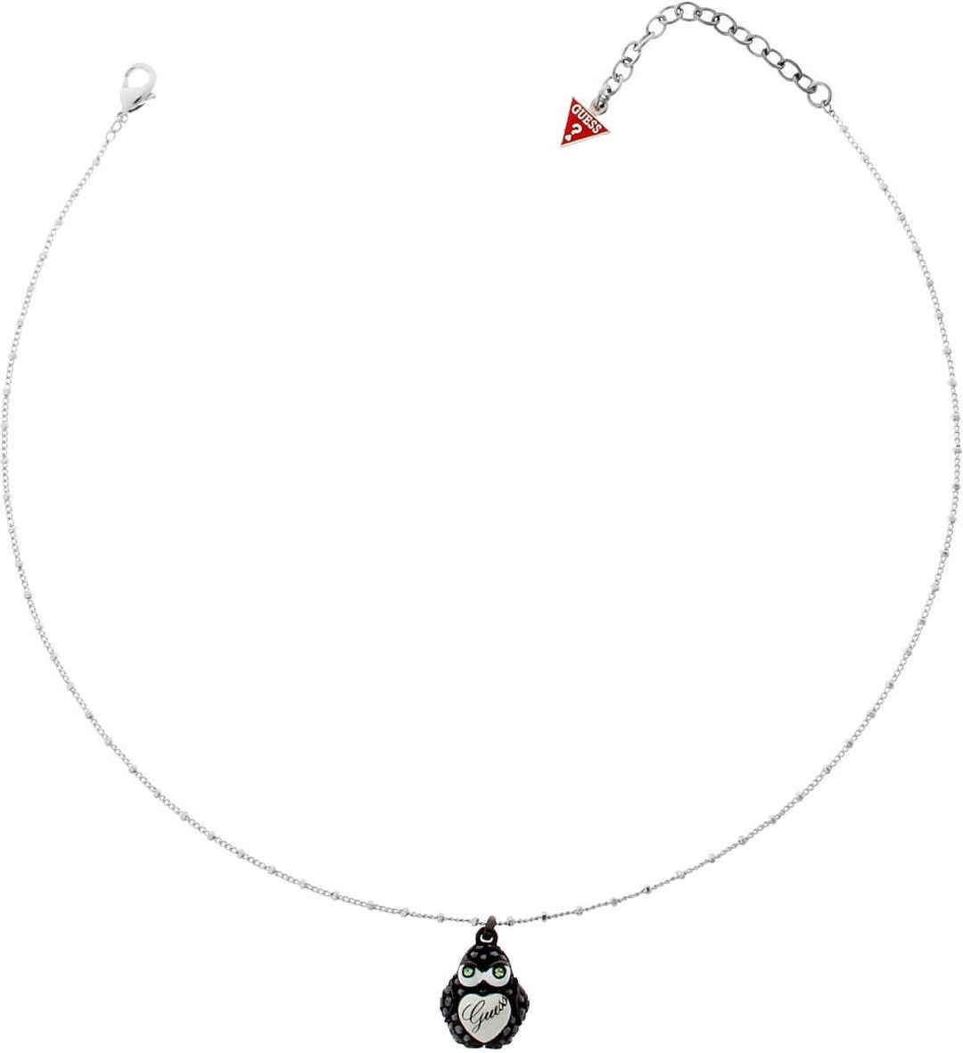 Sterling silver pendant necklace featuring penguin charm and red triangular GUESS charm on adjustable chain