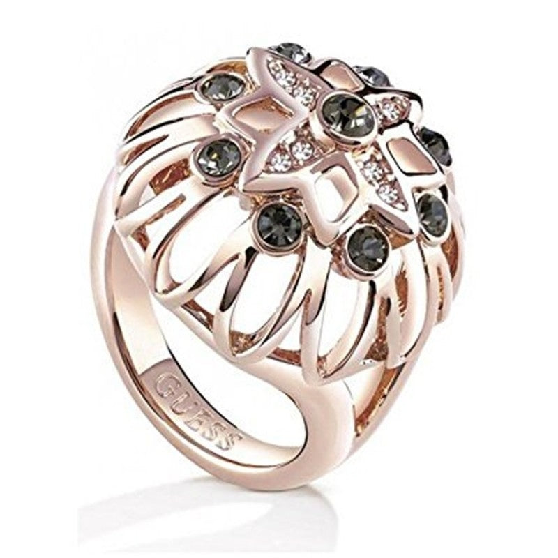Rose gold ornate floral ring with black and clear stones and openwork detailing on finger