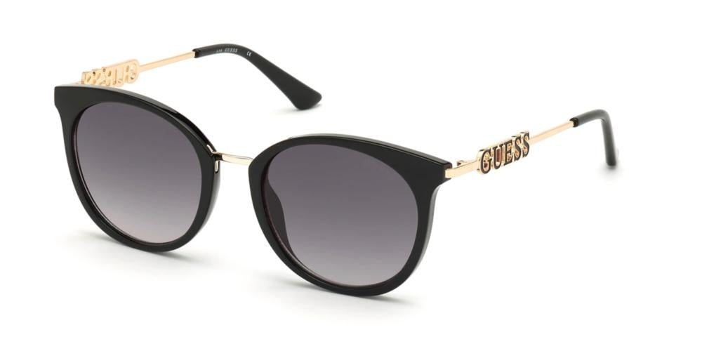 Black cat-eye sunglasses with gold temple arms, gradient lenses and logo on temples, leather case included