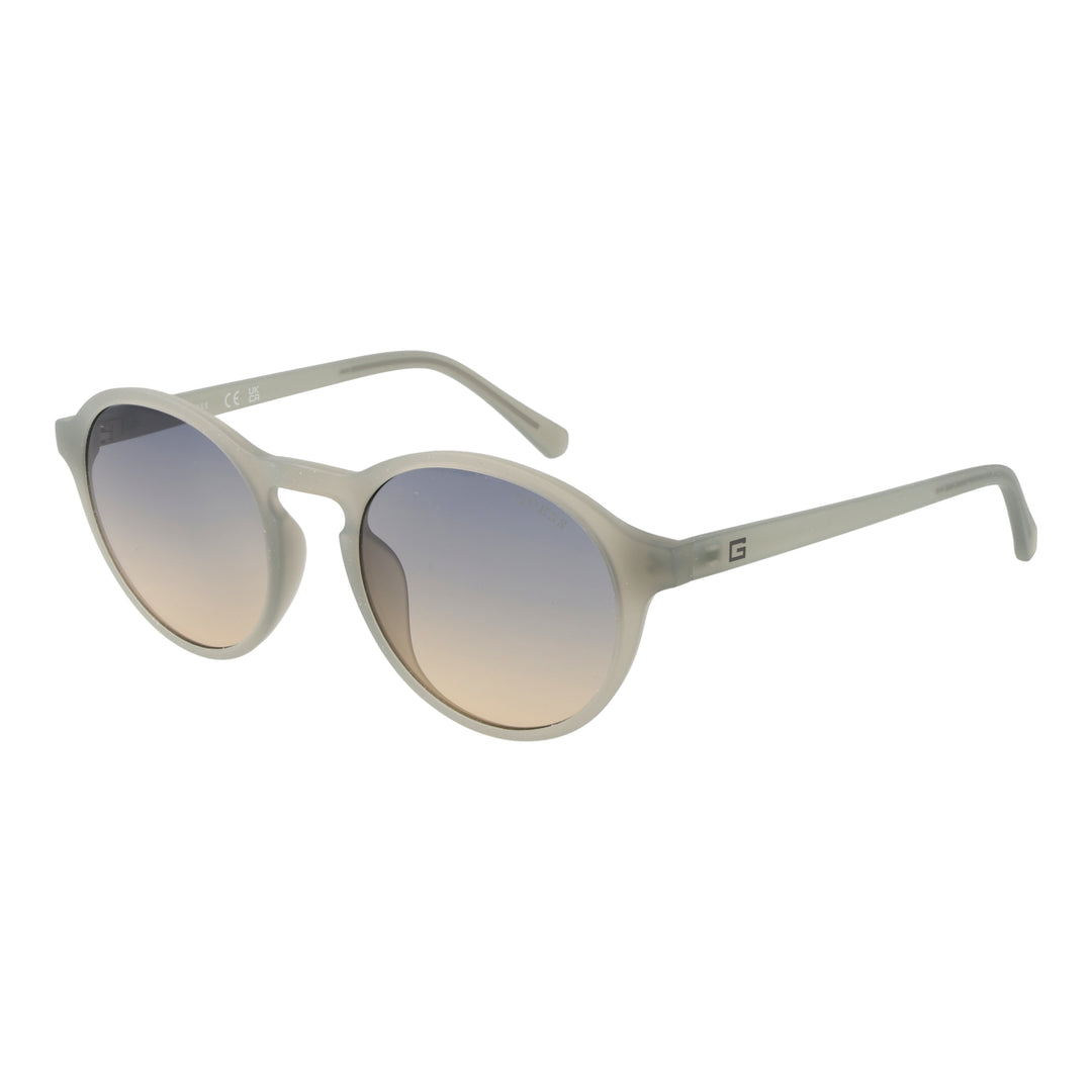 Translucent gray round sunglasses, blue-to-beige gradient lenses, keyhole bridge, plastic frame on white