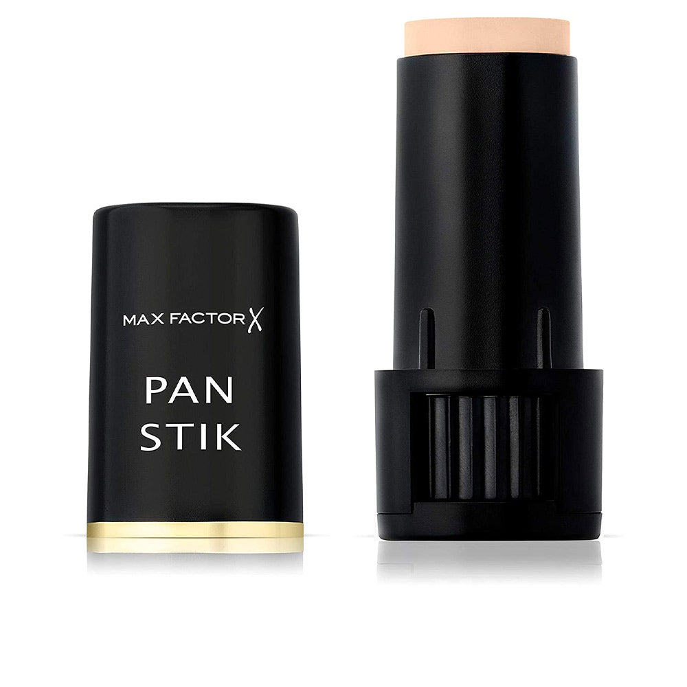 Creamy beige corrector stick in twist-up tube, shade cool copper