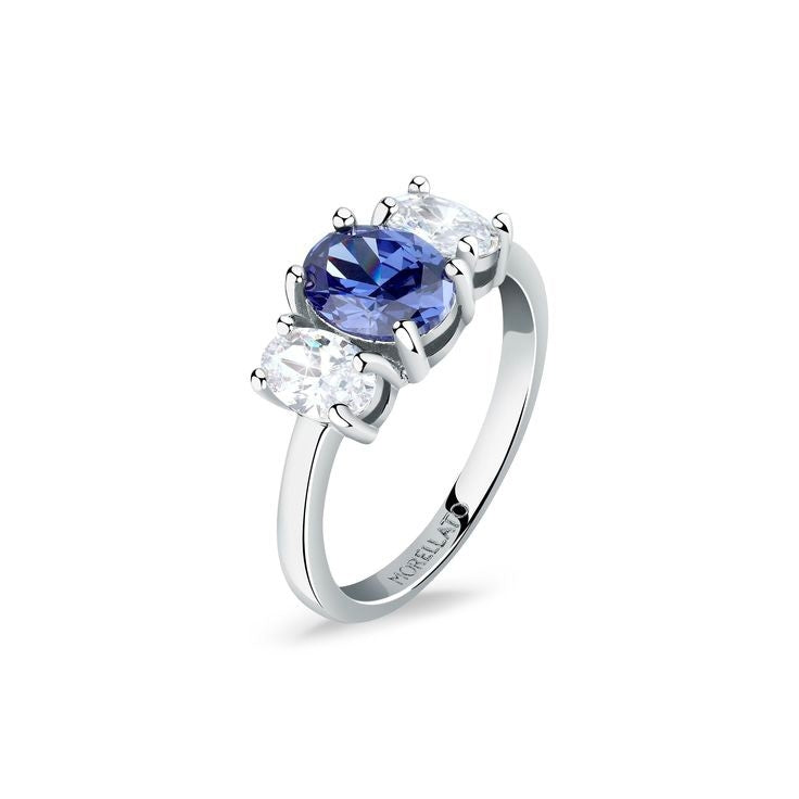 Silver three-stone ring with oval blue center zircon and two round white zircons in prong setting