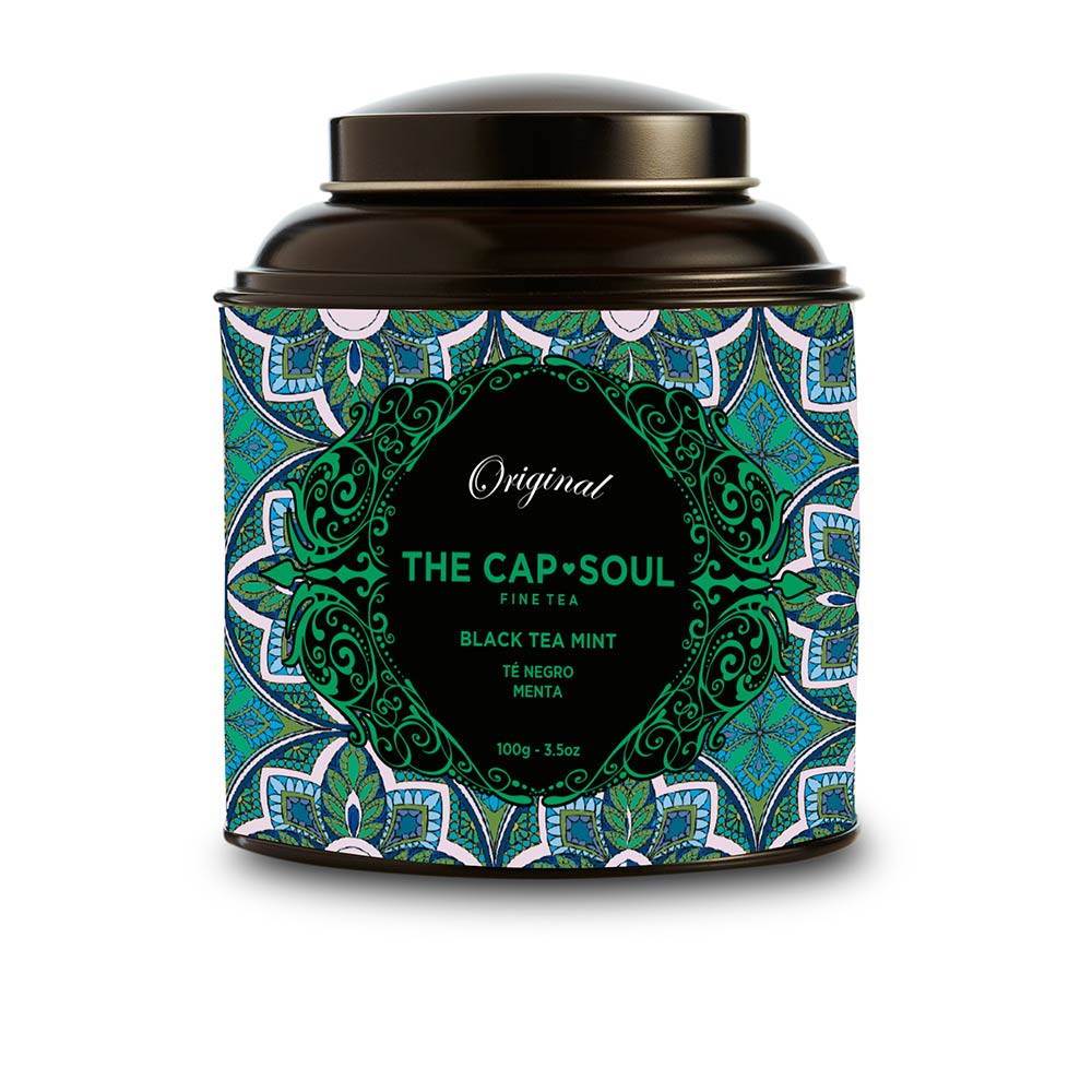 Glass jar of loose black tea mixed with fresh mint leaves, 100 g pouch