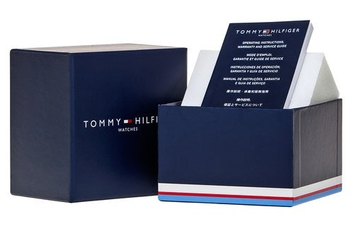 Tommy Hilfiger silver and blue stainless steel chronograph wrist watch on neutral background